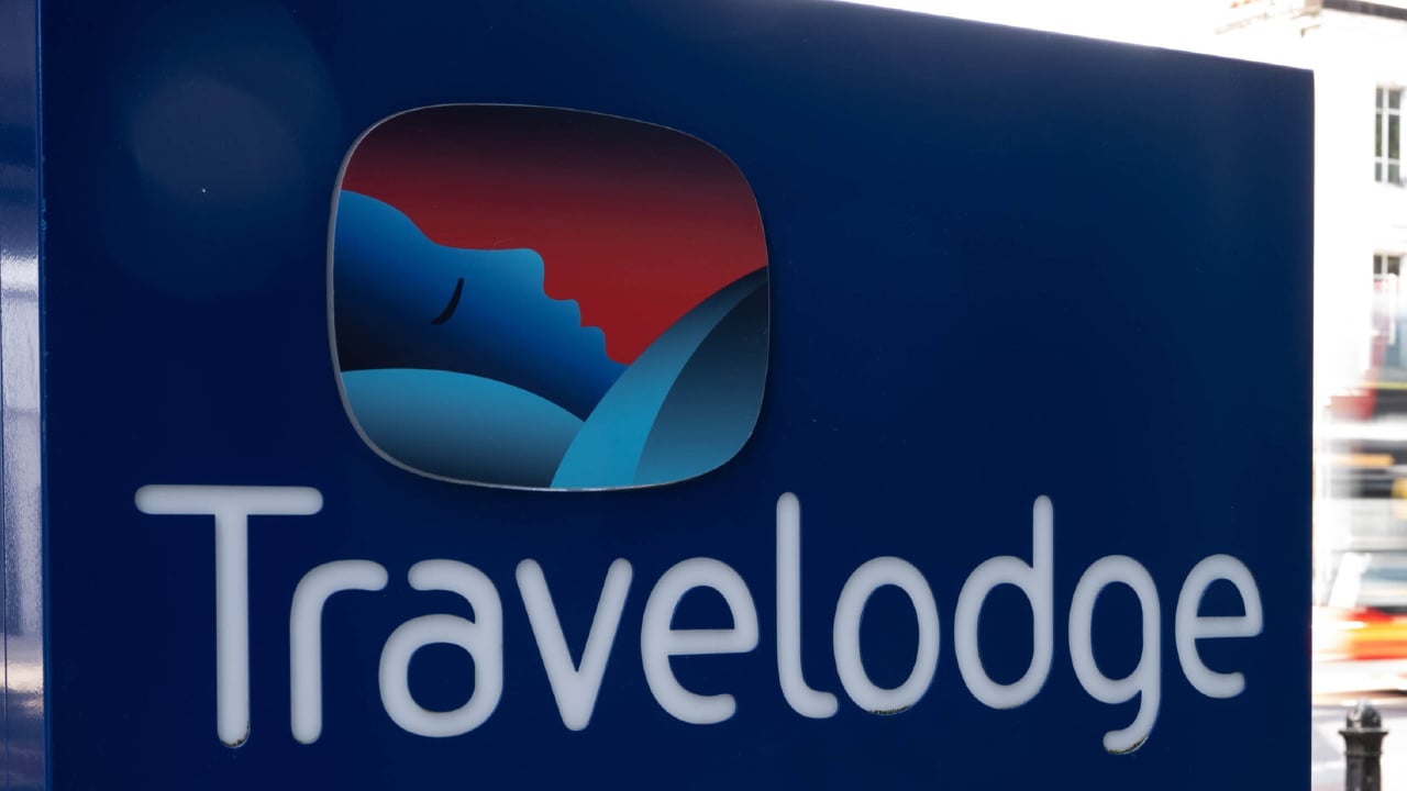 A Travelodge logo on a sign