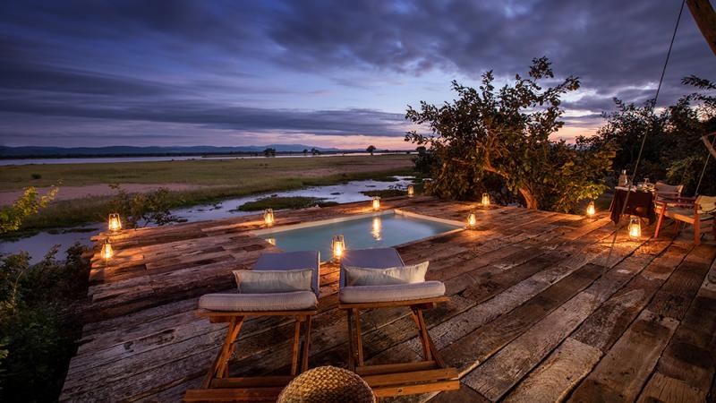 A pool on a deck overlooking the Zambezi