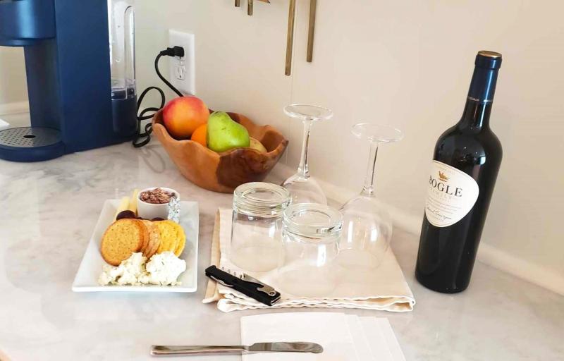 This spread of cheese, crackers, red wine and fruit awaits Sky Suit guests upon arrival on American Eagle. 