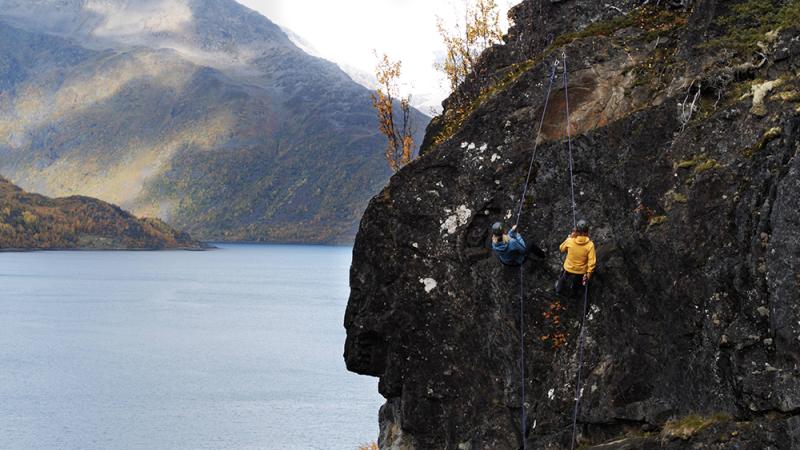 Two people rock climbing in Norway