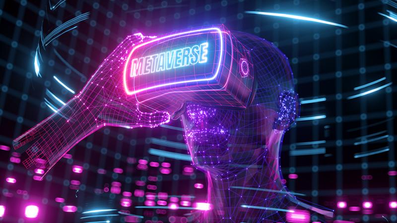 a neon graphic of a person wearing VR goggles that read "metaverse"