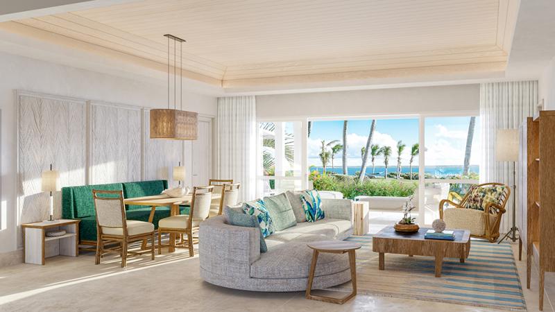 Rendering of a hotel living room with a sliding door opening to the beach