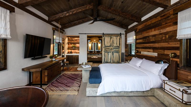 A hotel guestroom resembling a log cabin