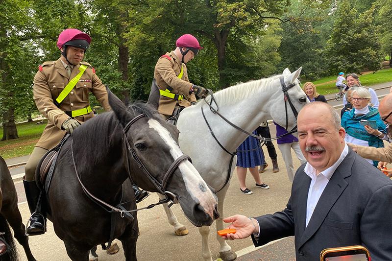 Matthew Upchurch feeding the cavalry horses in Hyde Park
