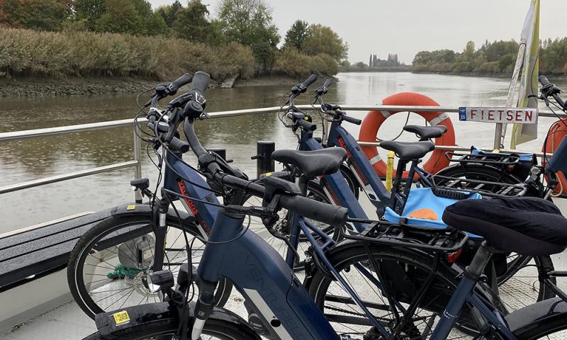 electric bikes on the front of a ferry in Dendermonde, Belgium