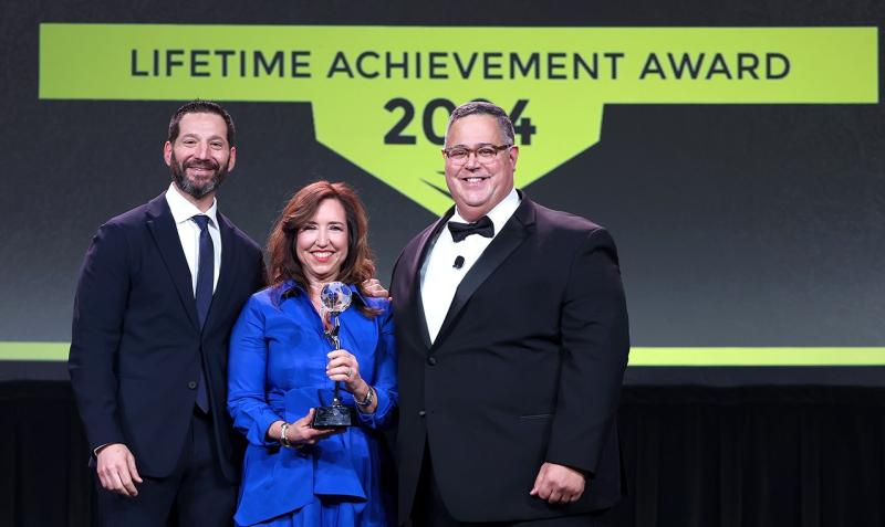 L to r, Josh Weinstein, Carnival Corporation; Christine Duffy, Carnival Cruise Lines, honored with CLIA's Lifetime Achievement Awards; and Charles Sylvia of CLIA. ith Charles Sylvia of CLIA at right.