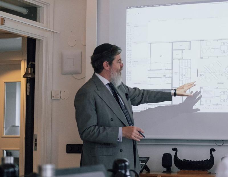 Matthew Shollar, CEO and co-founder, Transcend Cruises, reviews a schematic in his office.
