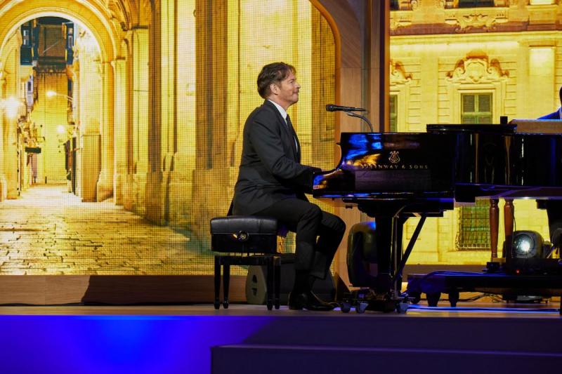 Harry Connick, Jr., performs an hour-long concert for VIP guests including travel advisors who are attending the christening of Oceania Cruises' new Vista.