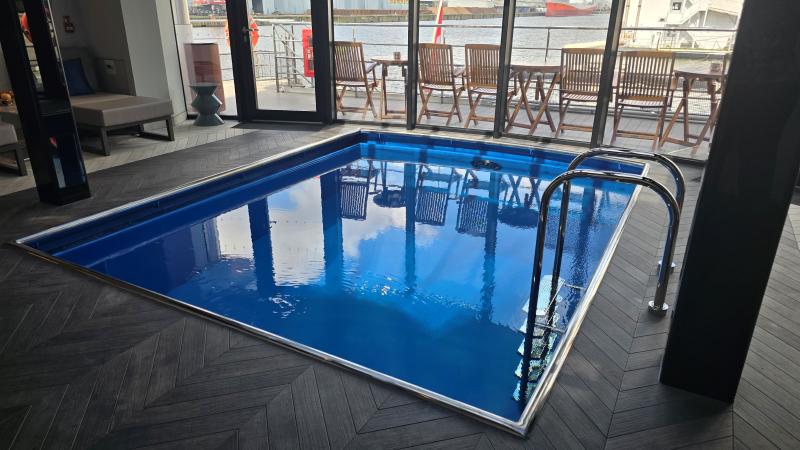 A decent-sized square pool is inside Deck 3 aft on Riverside Debussy.