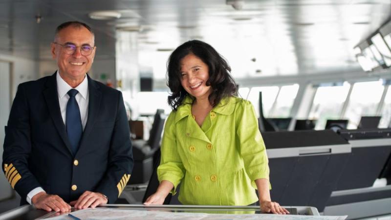 Natalya Leahy, Seabourn's president, is shown with Seabourn Venture's captain on the bridge. 