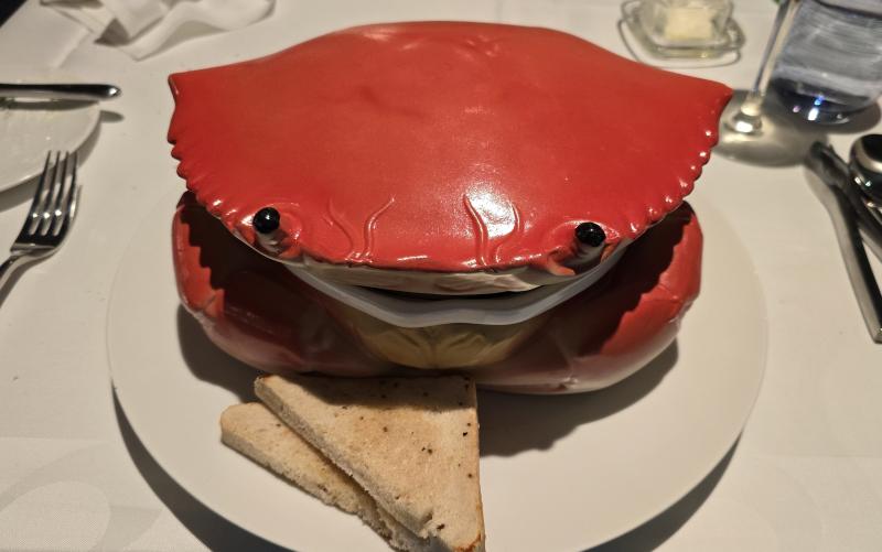 Our tasty chioppino arrived at "The Catch by Rudi" in this fanciful red crab pot