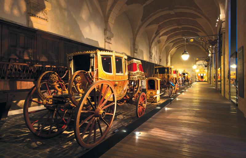The Gallery of Coaches in the Great Stables in Palace of Versailles.