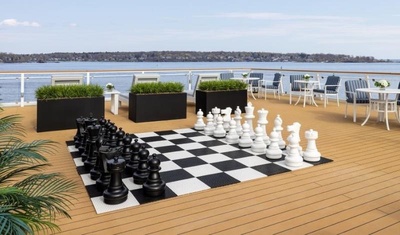 A humongous chess board on American Eagle's Sun Deck is ready for play by guests.
