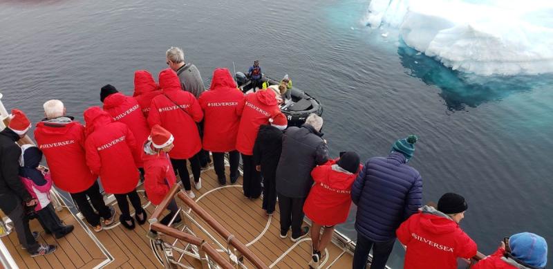 Silver Endeavour's guests watch "The Polar Plunge" in Antarctica.