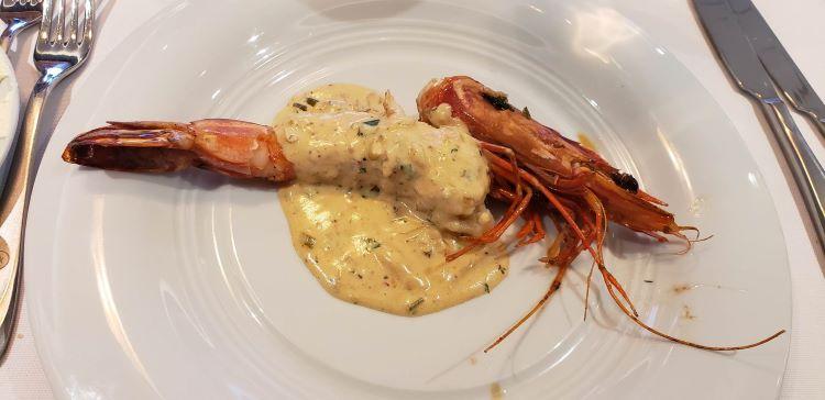 Shrimp dish based on recipe from Chef Rudi Scholdis, a Gastronomic Guests aboard Atlas Ocean Voyages' World Traveller.
