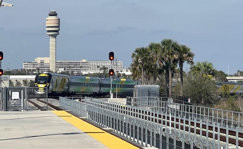 A Brightline train is shown at Orlando International Airport.
