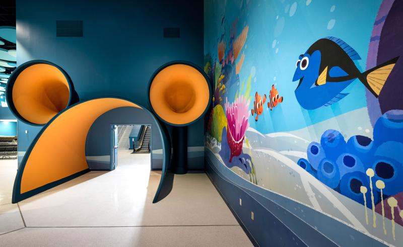 Guests will know they're in a Disney terminal at Port Everglades with a "mouse ears" entry and wall murals that depict the Pixar film, "Finding Nemo."
