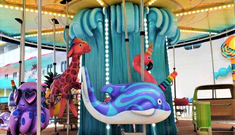The carousel at Surfside on Royal Caribbean's Icon of the Seas was designed by kids for kids.