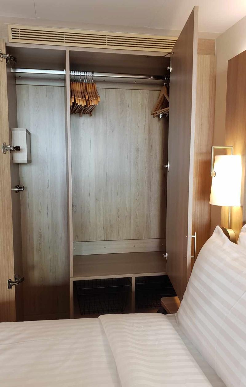 The storage closet of an infinite balcony stateroom, #10593, on Icon of the Seas.