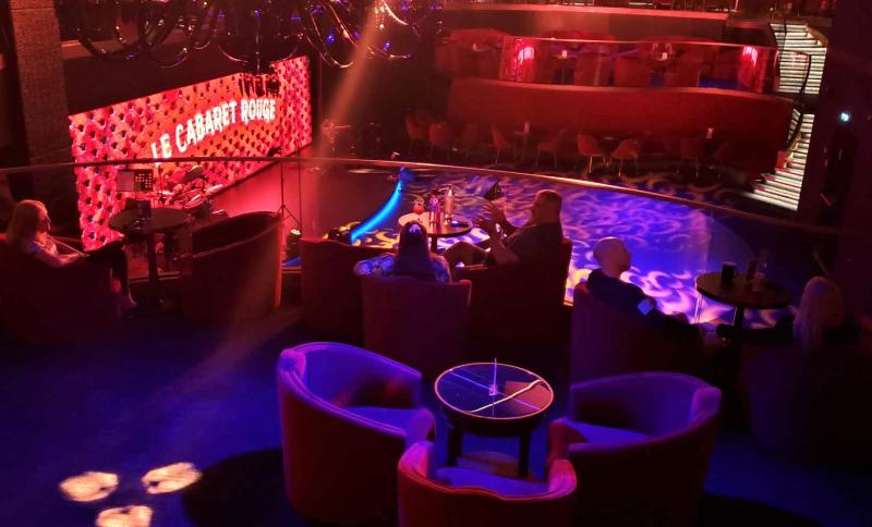 Le Cabaret Rouge, a two-level nightclub resembling a French supper club of the 1920s. It's a spot for live entertainment on MSC Seascape.