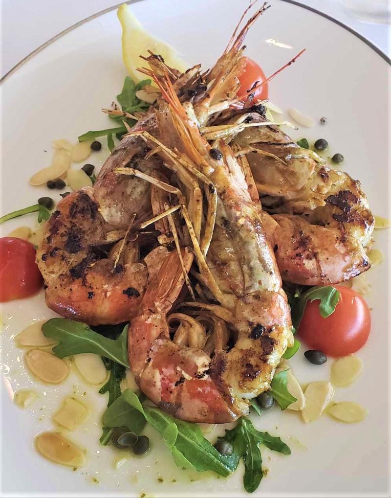 A lunchtime entree of "Grilled Jumbo Shrimp" at the MSC Yacht Club Restaurant on MSC Seascape.