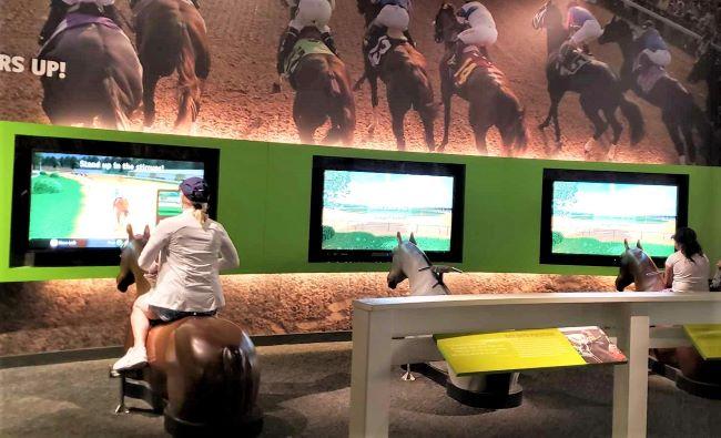 Visitors can hop aboard a "horse" for a virtual reality race around the track at Churchill Downs. 