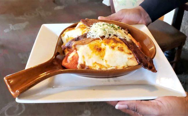 The classic "Hot Brown," a famous turkey sandwich concocted by The Brown Hotel.