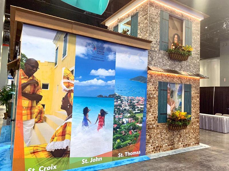 The colorful U.S. Virgin Islands booth at Seatrade Cruise Global caught the attention of conference delegates