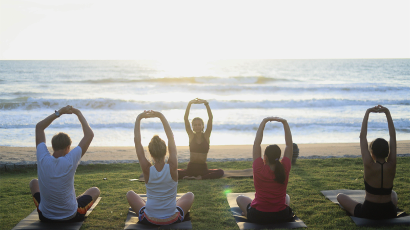 Beachside yoga at Ayurah Spa & Wellness Centre