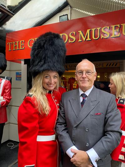 Stephanie Fisher, Huffman Travel with Andrew Wallis, curator of The Guards Museum. 