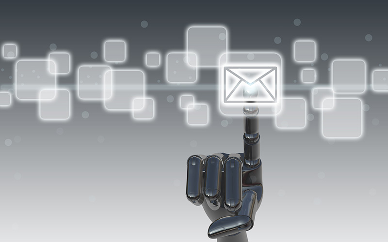 Robot hand touching email symbol