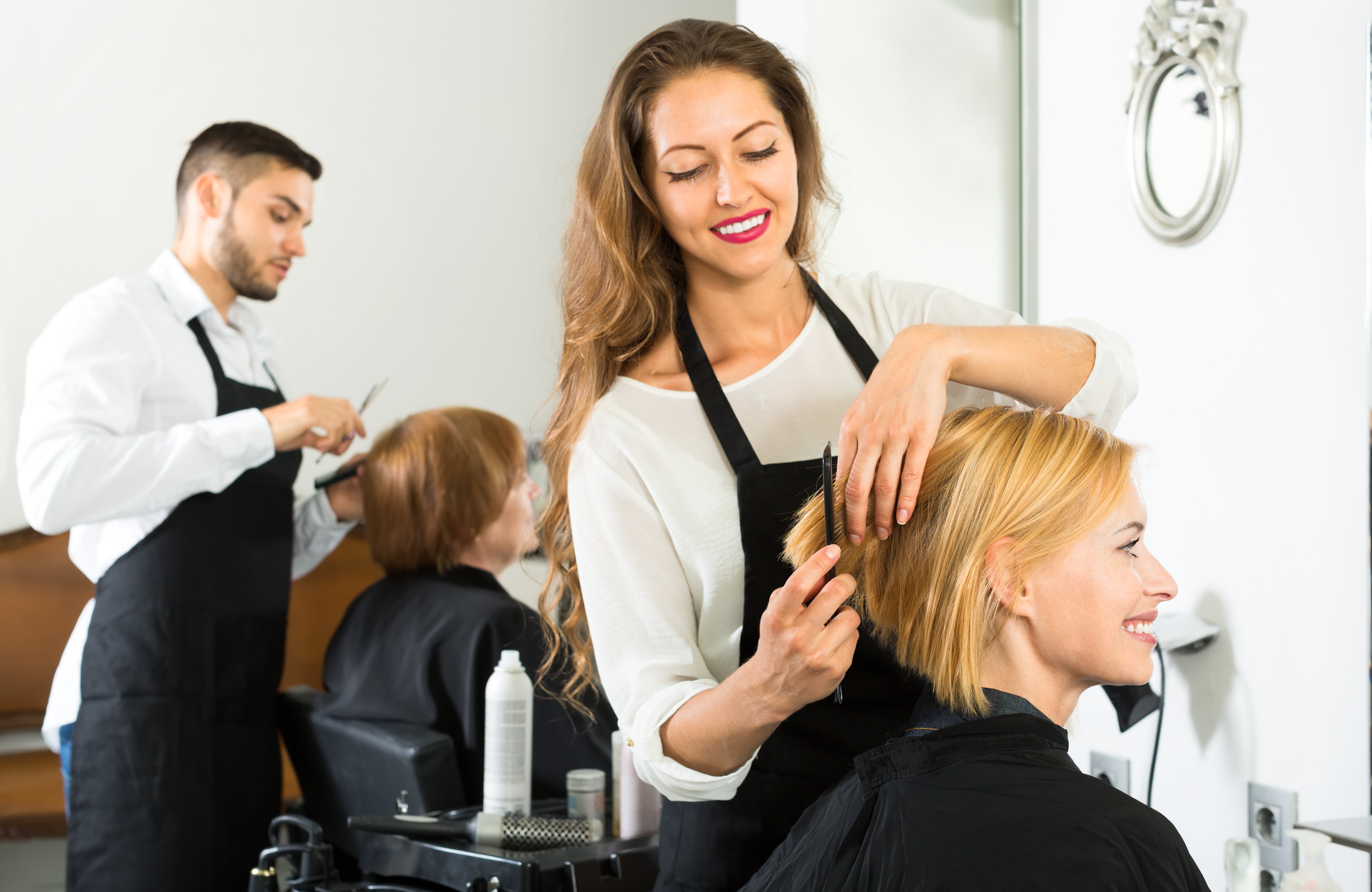 Hairstylist Helping Customer 