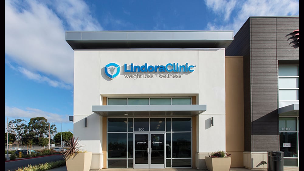 image of a white building with Lindora Clinic sign on it