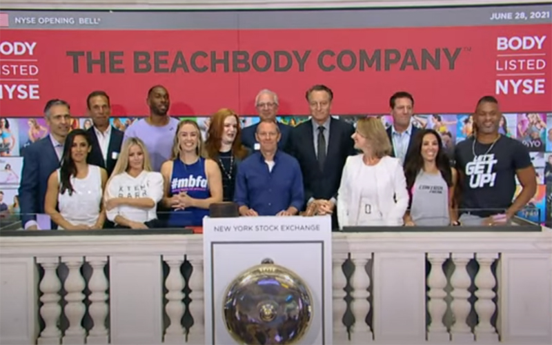 Carl Daikeler Beachbody CEO rings open the New York Stock Exchange surrounded by other members of his team