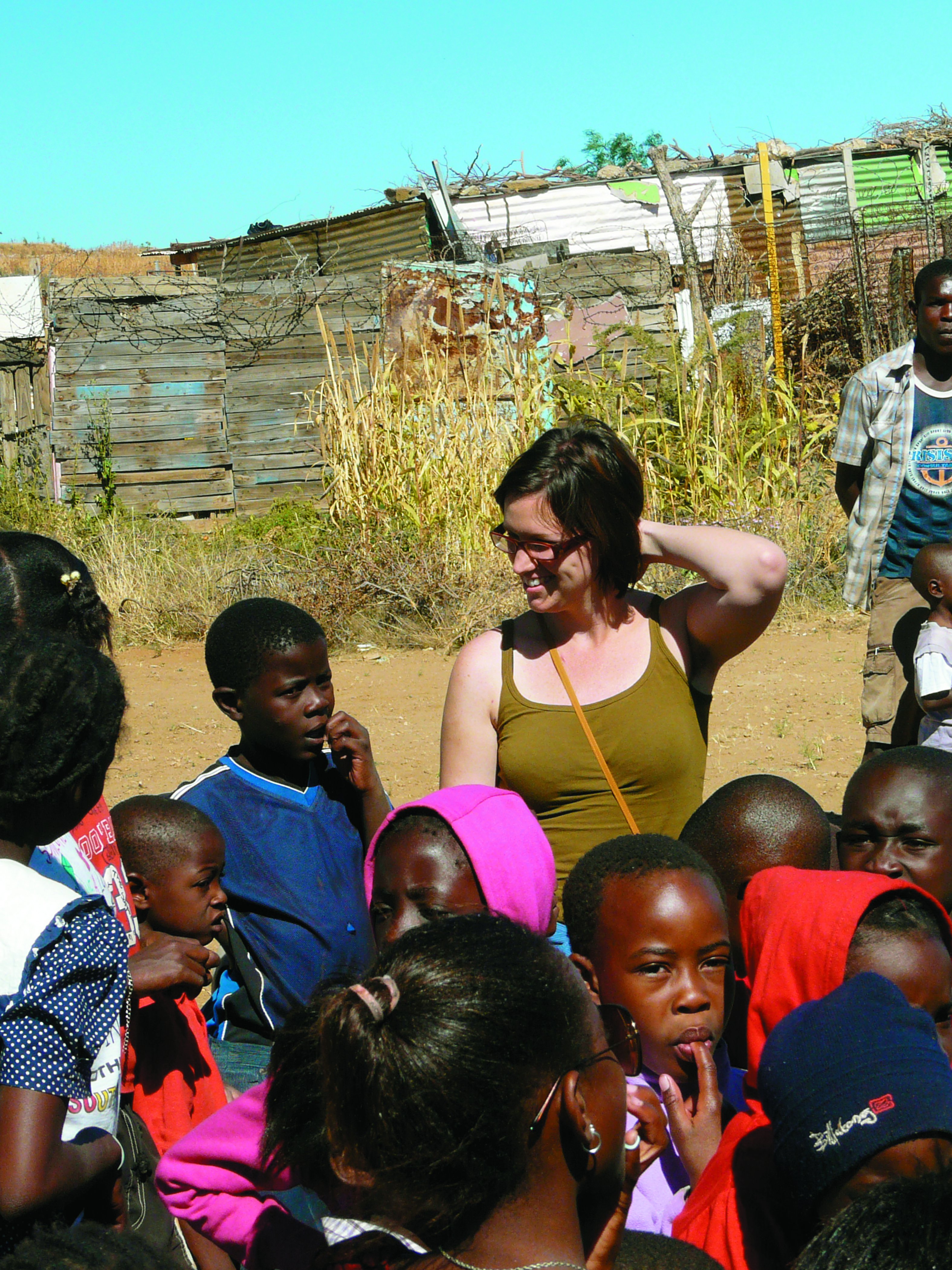 Erin Munsch with a group of children at a Kids-Soup Kitchen outreach event in Katutura a poor district of Windhoek