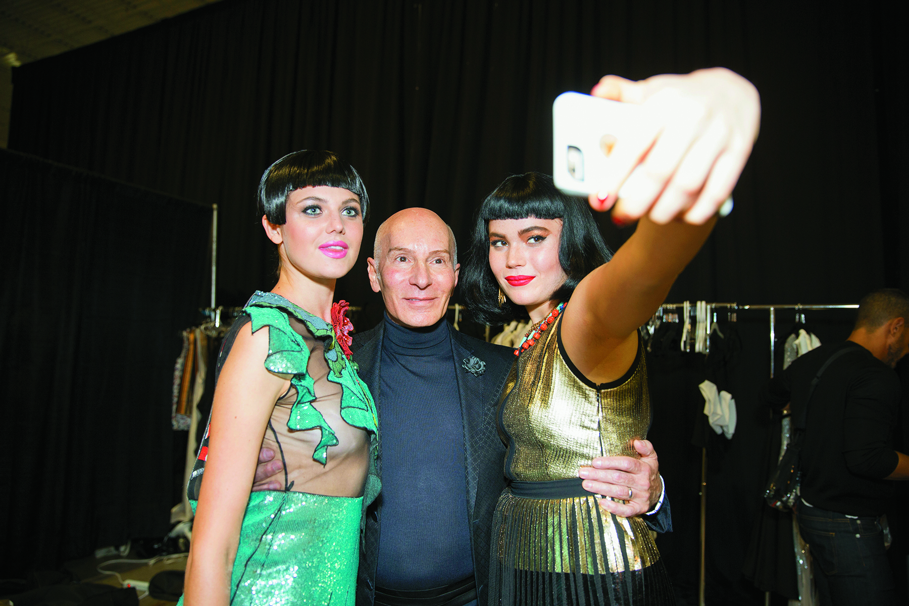 Models taking a selfie with Garren backstage