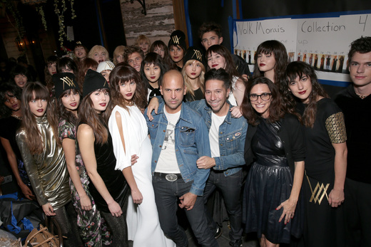 Designers Claude Morais and Brian Wolk pose with stylist Elizabeth Stewart and models from the show