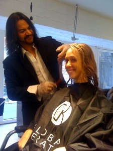 Leslie Correa applying the treatment to my hair