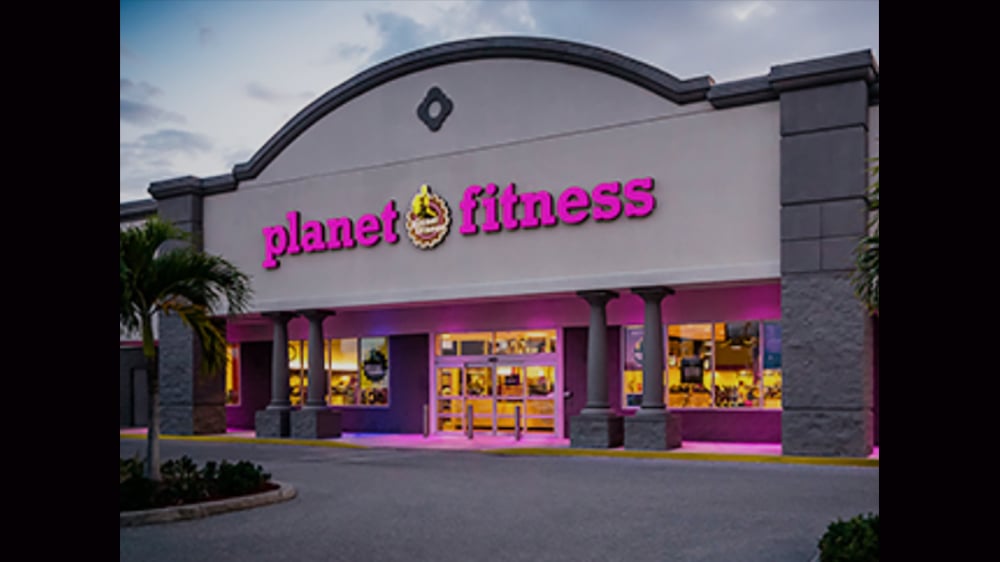 image of Planet Fitness club with pink Planet Fitness up top