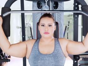 Obese woman strength training