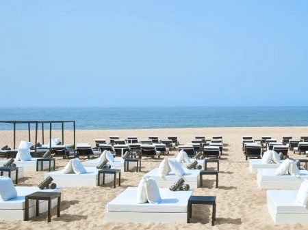 Outdoor dining area with views of the beach