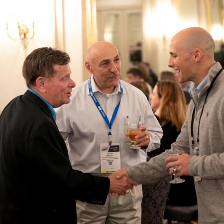 Club Industry friends shaking hands