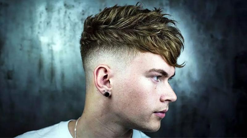 Thick fringe haircut with a high fade