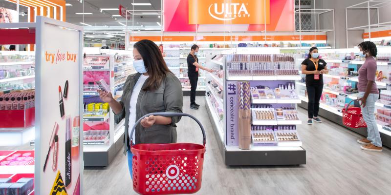 Image of woman in face mask shopping at Ulta Beauty at Target 