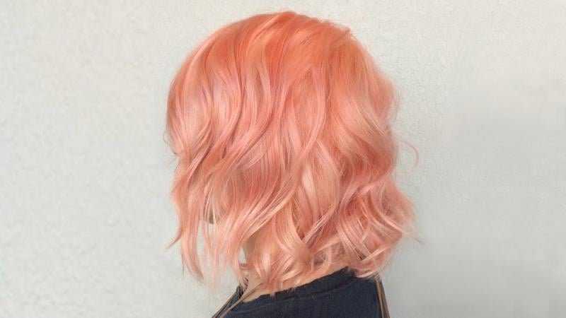 Peach Fuzz haircolor by Paige Brueck