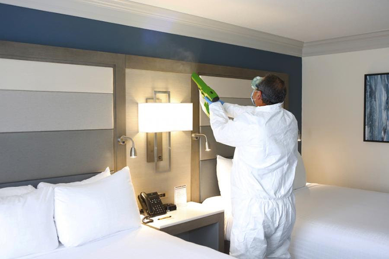 Housekeeping thoroughly sanitizes each guestroom here at Rosen Centre with an electrostatic sprayer that uses hospital-grad