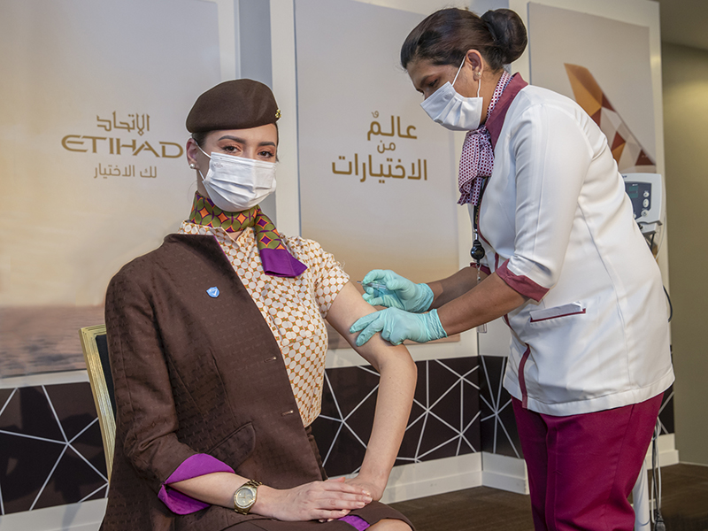 Etihad employee being vaccinated 
