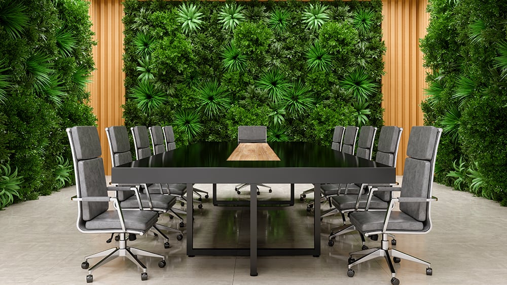 Meeting room with green plant walls