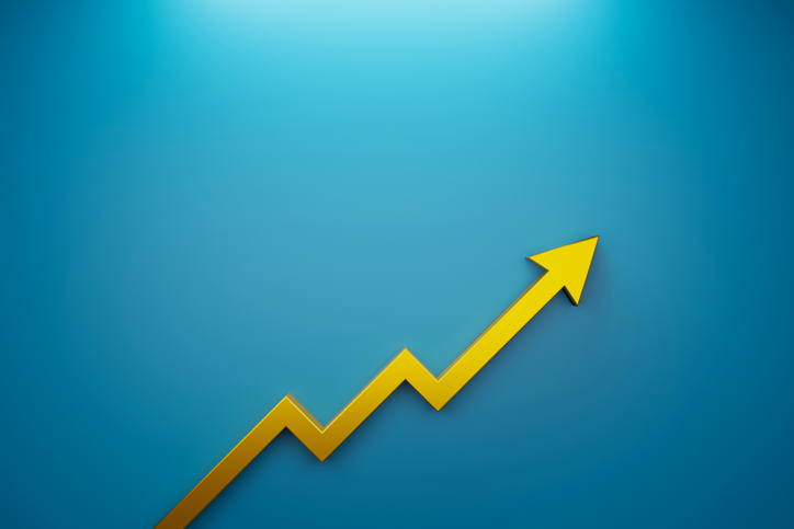 Arrow sign growth on blue background Business development to success and growing growth concept
