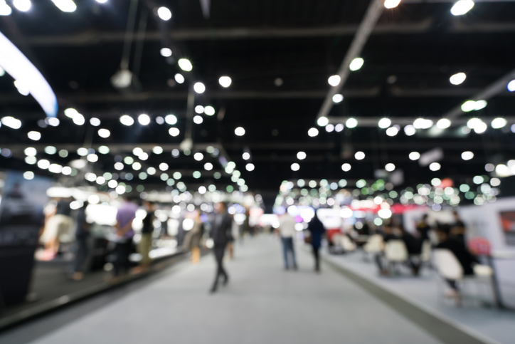 Blurred defocused background of public exhibition hall Business tradeshow or stock market organization or company event c